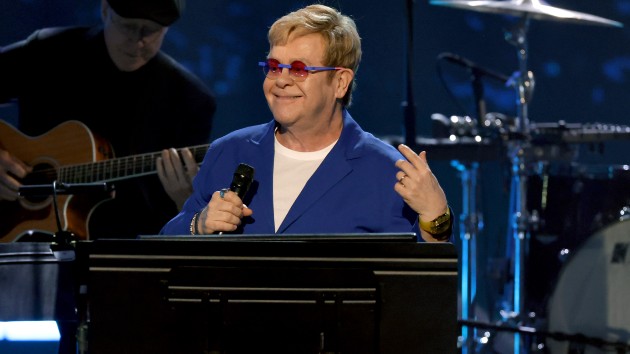 After criticism, Elton John posts video of himself cleaning his oven